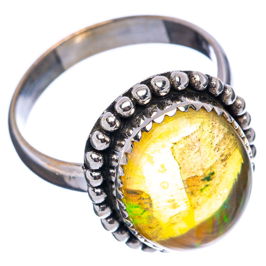 Sterling silver opal ring, side view, oval yellow opal with green flashes