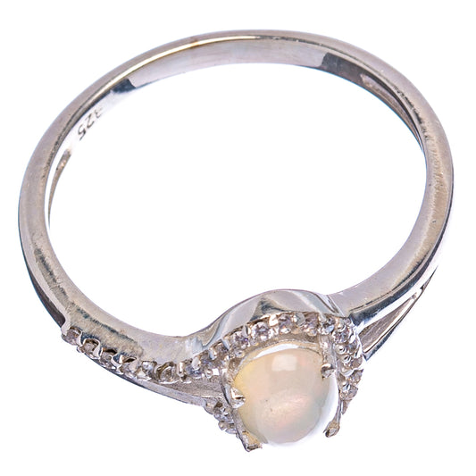 Sterling silver band ring with teardrop opal bezel and round cubic zirconia accents