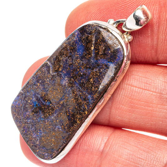 Sterling silver boulder opal pendant, blue and gold stone bezel, round bail
