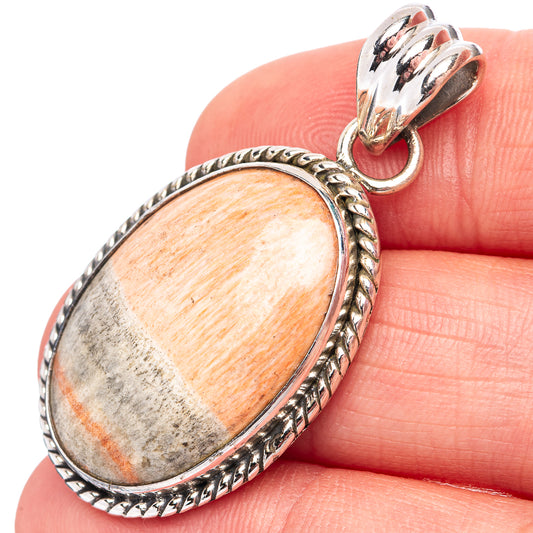 Oval celestobarite pendant close-up, .925 sterling silver orange-gray stone with rope bezel