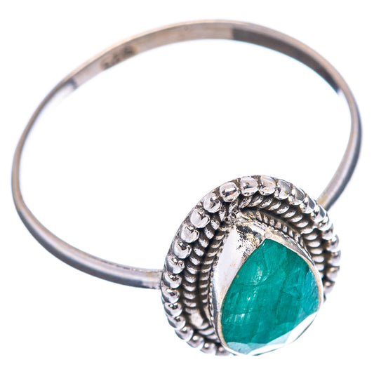 Sterling silver ring with raised bezel green teardrop stone and textured band