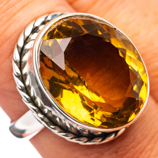 Sterling silver ring with large amber oval beer quartz centerpiece, twisted band
