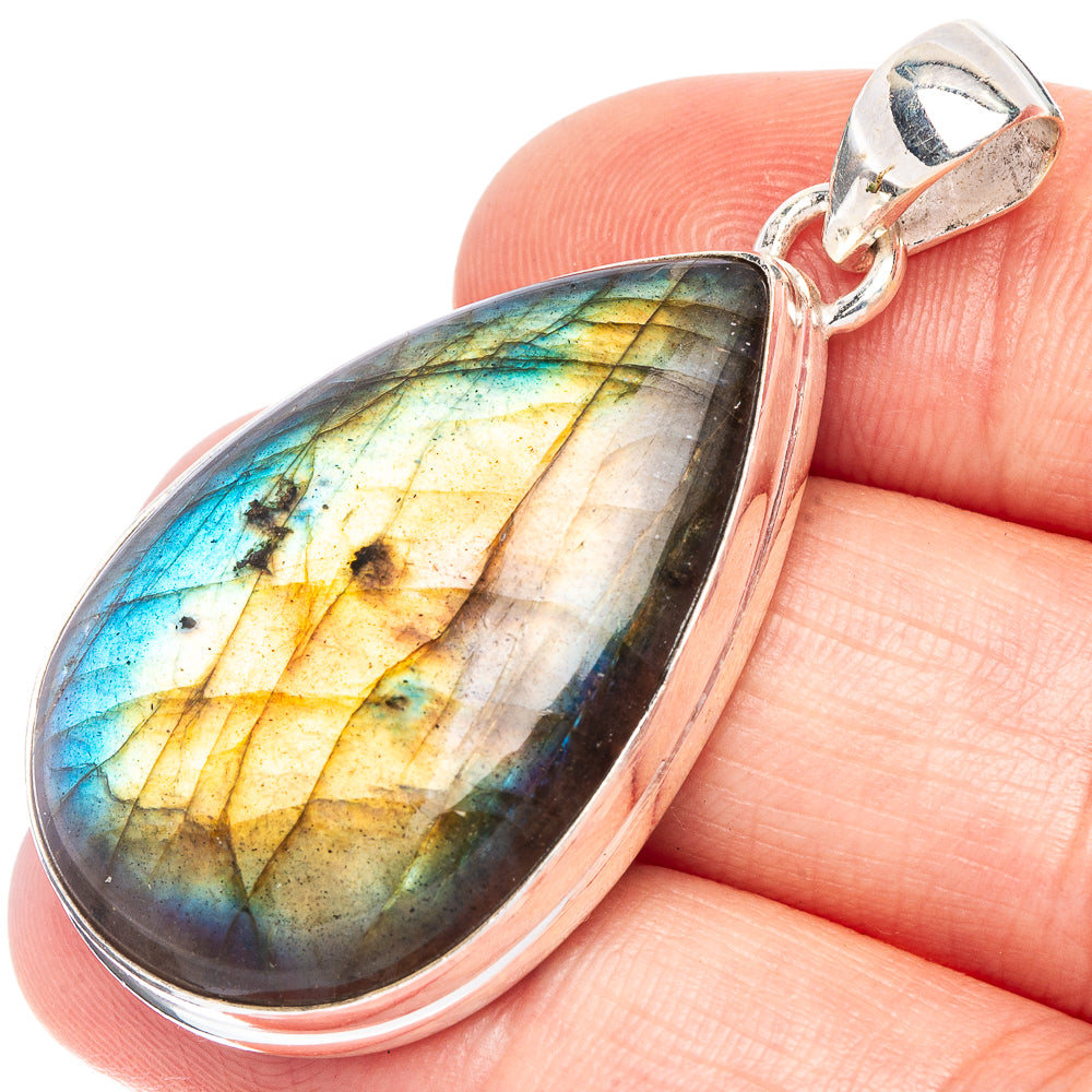 Labradorite teardrop pendant in 925 sterling silver bezel, blue-green flash.
