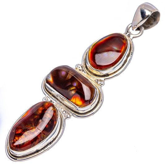 Fire agate pendant with three oval stones in 925 sterling silver frame, angled view