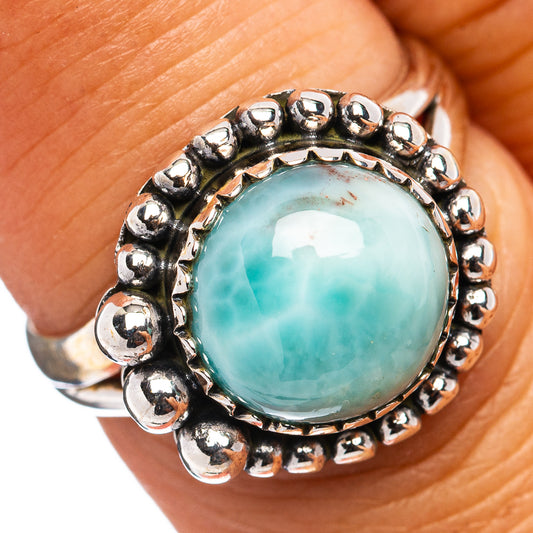 Sterling silver Larimar ring with oval turquoise gemstone and beaded halo setting