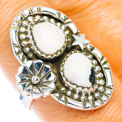 925 sterling silver ring with two oval white stones, star and floral cutwork