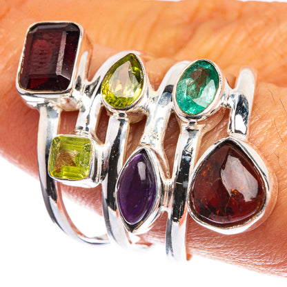 Sterling silver multi-gem ring with dark red, green, purple, and teal stones in bezels