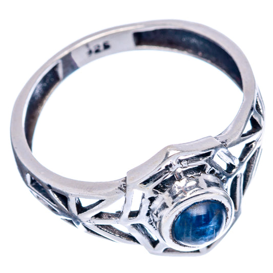 Dainty sterling silver ring with round blue kyanite bezel and cutout lattice band