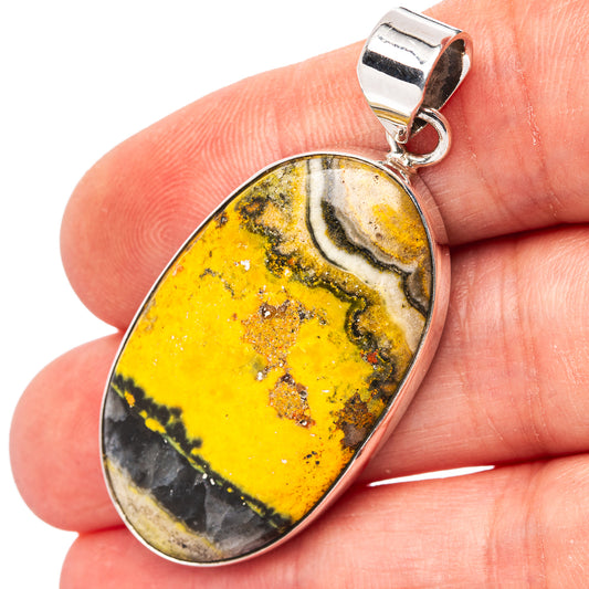 Sterling silver bumblebee jasper teardrop pendant with yellow and dark stone pattern