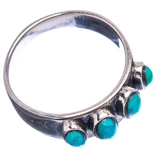 Silver ring with four turquoise oval settings around the band, open view