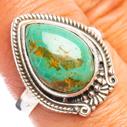 Turquoise teardrop ring in .925 sterling silver with rope bezel and scalloped edges