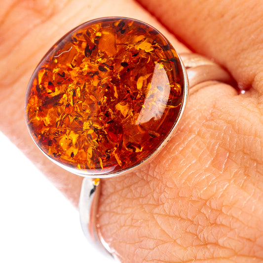 Round amber gemstone cocktail ring in .925 sterling silver, adjustable band