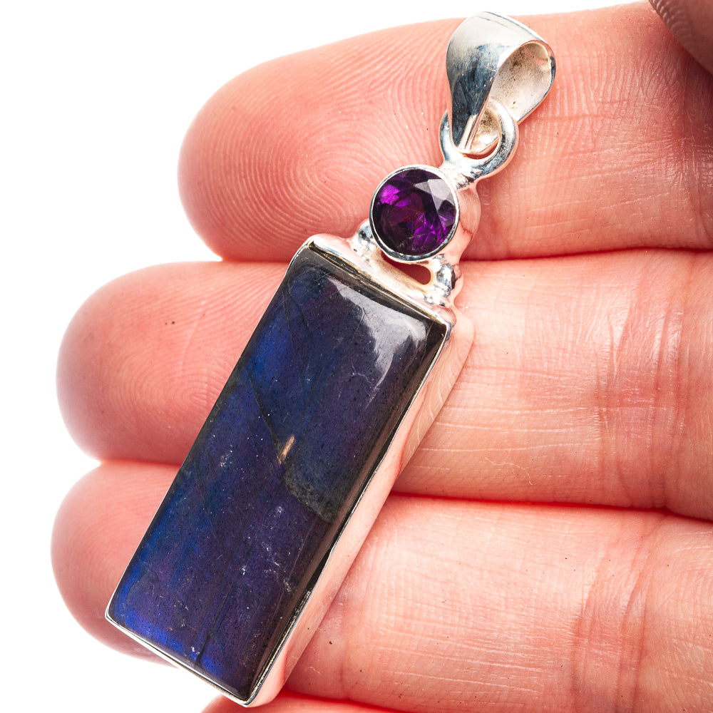Sterling silver pendant close-up with amethyst round stone and blue labradorite rectangle