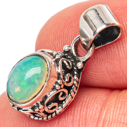 Oval green opal pendant in ornate 925 sterling silver bezel, with split bail