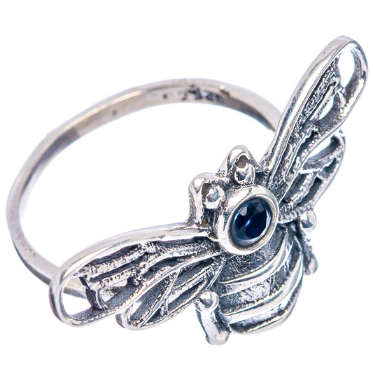 Sterling silver bee ring featuring blue round stone and raised wing details