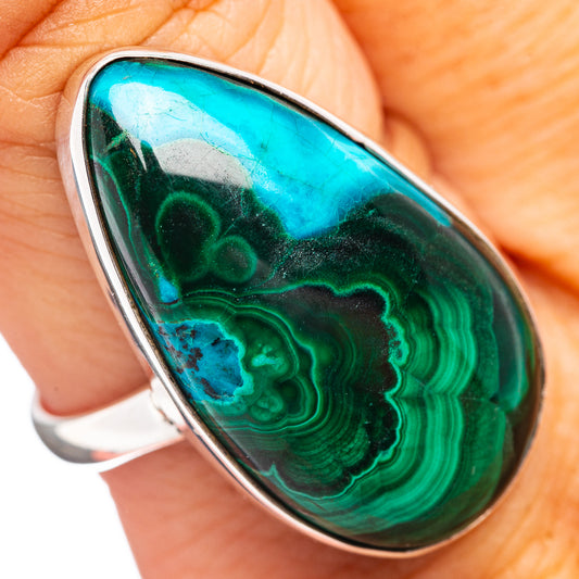 Oval malachite and chrysocolla ring with silver bezel, teal and green stone detail