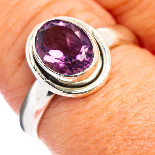 Amethyst sterling silver ring with oval purple gemstone, double-banded setting