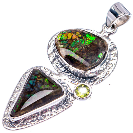 925 sterling silver ammolite pendant featuring two bezel-set stones and a round peridot center.