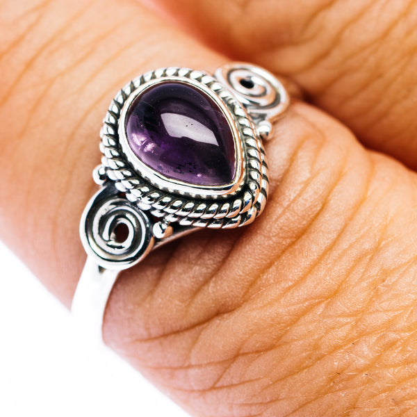 Sterling silver amethyst oval ring with ornate swirl settings, size 9.5