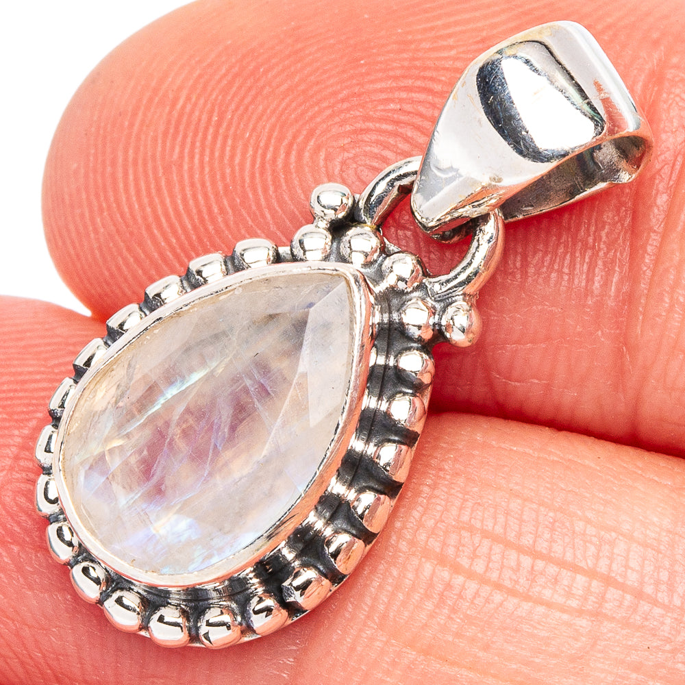Oval rainbow moonstone pendant in 925 sterling silver bezel with bead detail bail