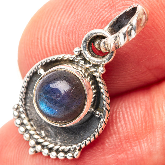 925 sterling silver labradorite pendant with round faceted blue stone and ornate frame