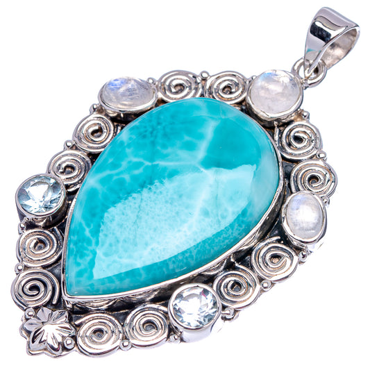 Larimar-style teardrop pendant in .925 sterling silver with turquoise center and round accents