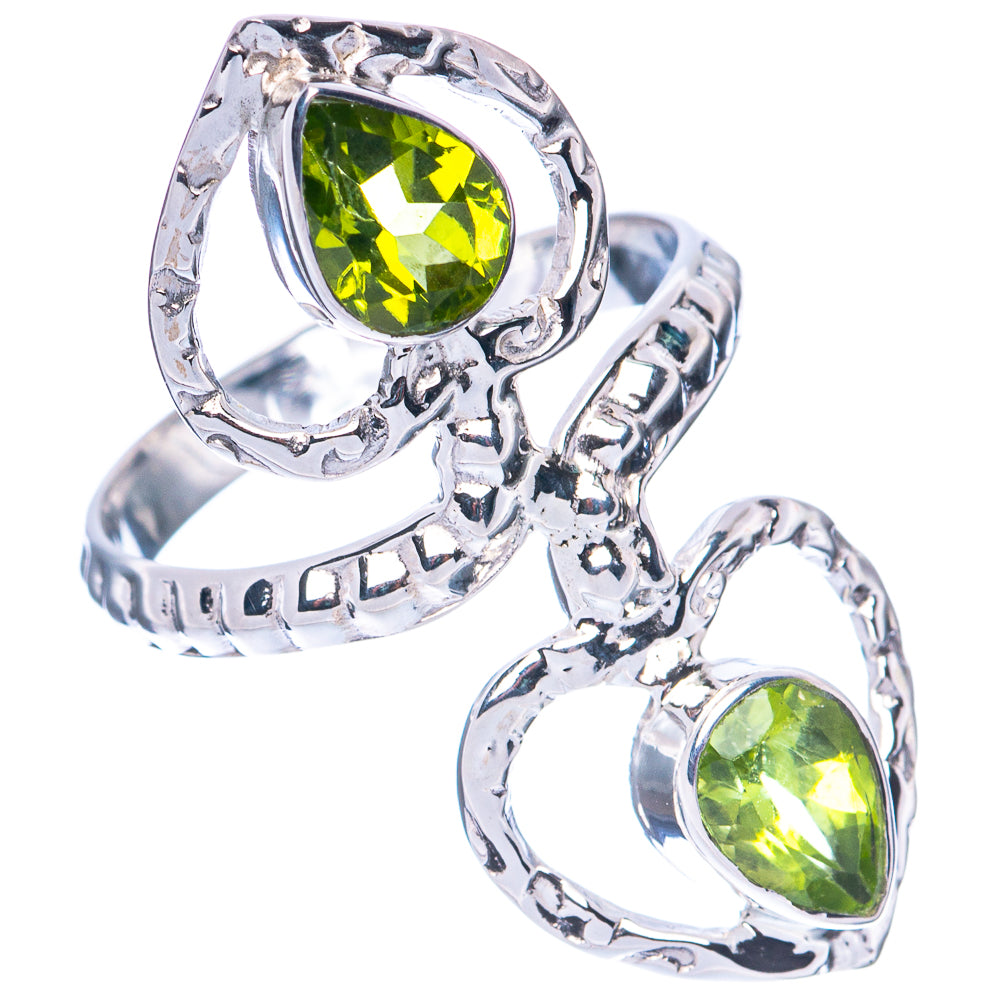 925 sterling silver ring with two heart-shaped peridot green gemstones