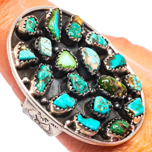 Adjustable sterling silver turquoise ring with bezel-set oval turquoise stones