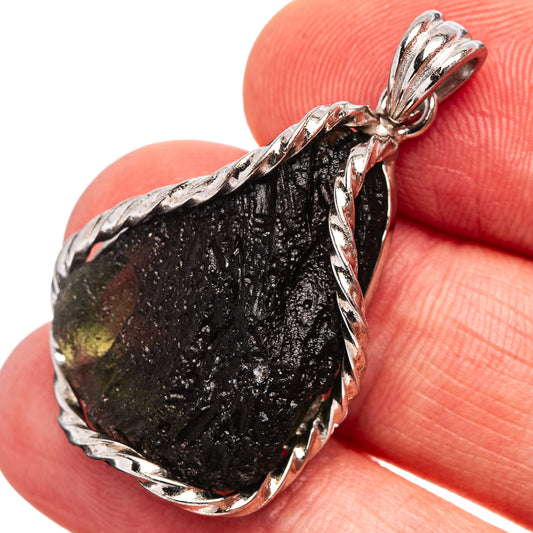 Sterling silver moldavite pendant, dark green teardrop stone with ornate bezel
