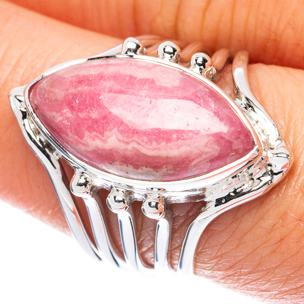 Oval pink rhodochrosite stone set in polished 925 sterling silver ring