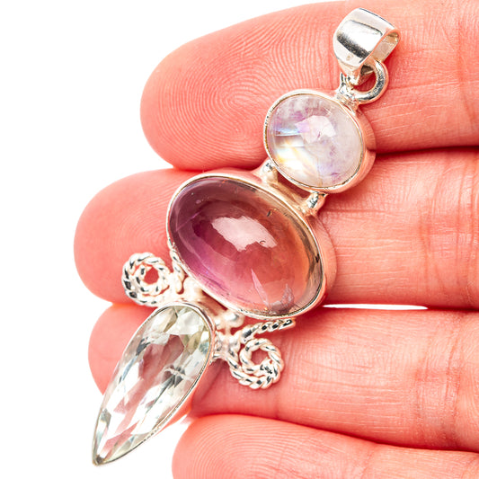 Sterling silver gemstone pendant with oval purple and round iridescent stones, drop charm