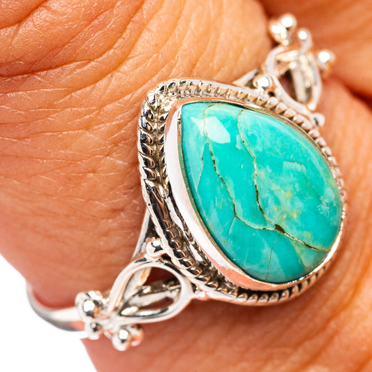 Turquoise cabochon ring in .925 sterling silver, oval stone with ornate rope setting