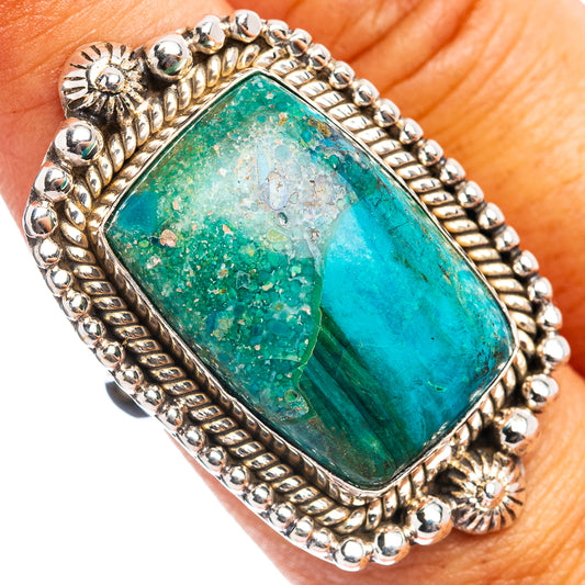 Sterling silver ring with square turquoise opal and beaded border on finger