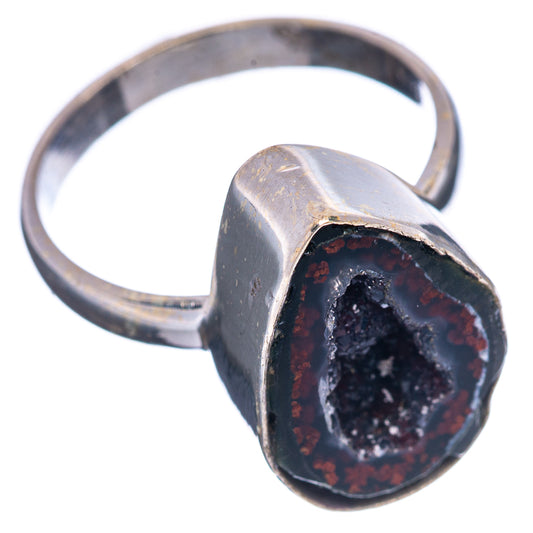 Sterling silver oval drusy ring, black center with red speckled edge, side view