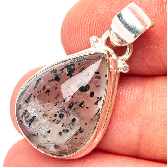 Teardrop sterling silver pendant with clear quartz, black specks, and round bail