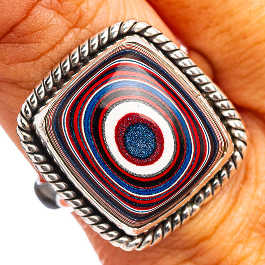 Sterling silver ring with blue, red, and white concentric inlay in a square bezel