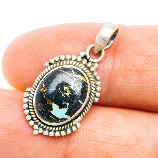 Sterling silver round pendant with blue-green inlay and beaded frame
