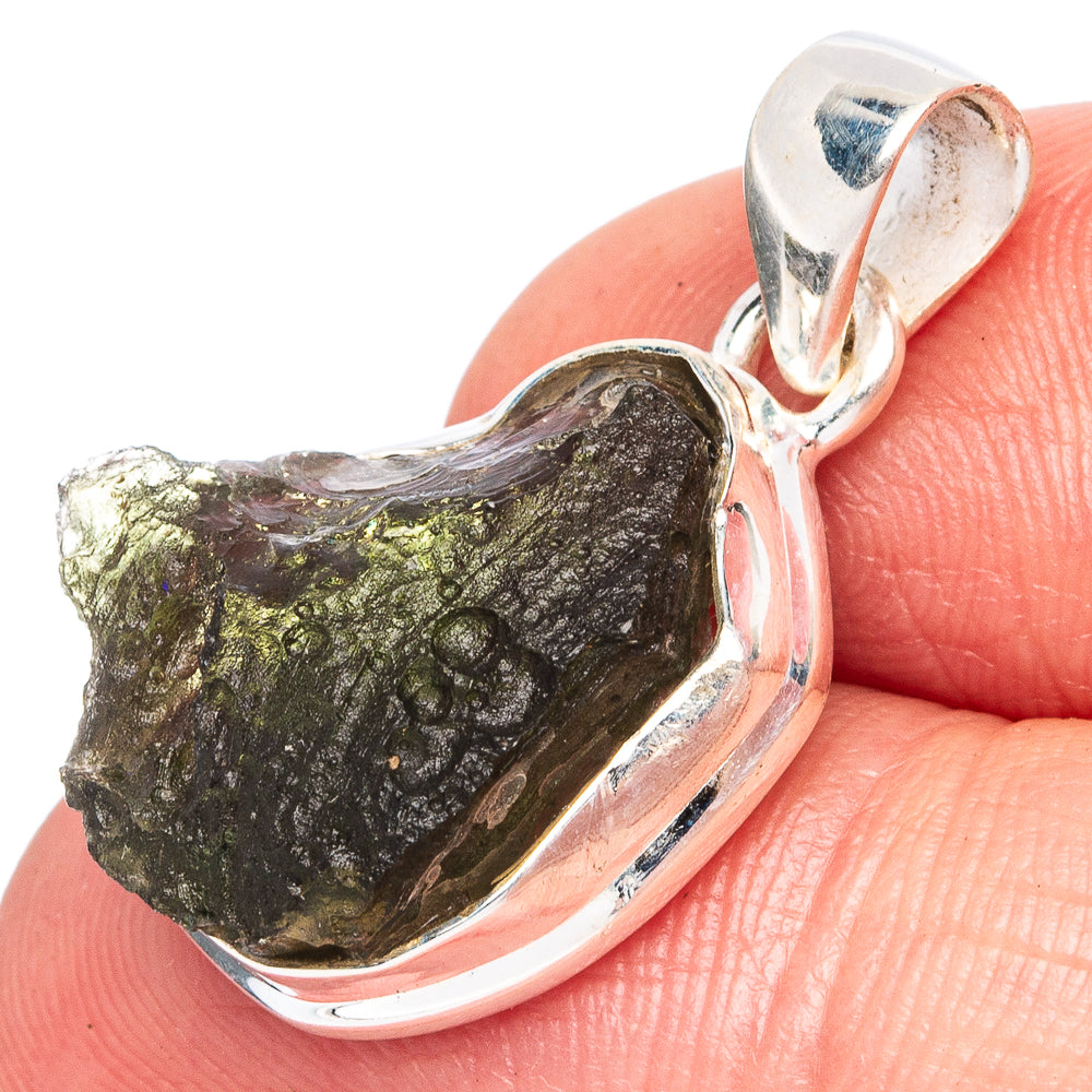 Moldavite pendant in sterling silver with irregular dark green stone, close-up bail