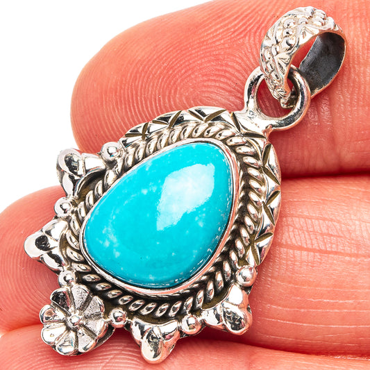 Turquoise oval pendant, ornate .925 sterling silver frame with loop bail