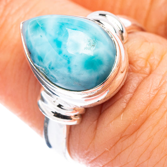 Oval blue larimar cabochon set in polished .925 sterling silver band ring
