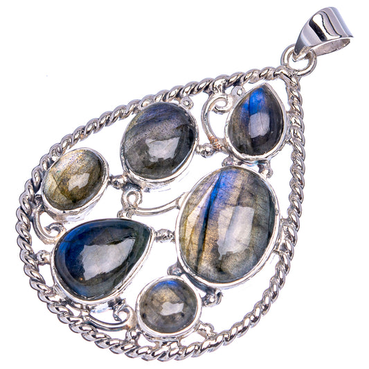 Oval labradorite pendant with mixed blue, gray, and green flashes on .925 silver setting