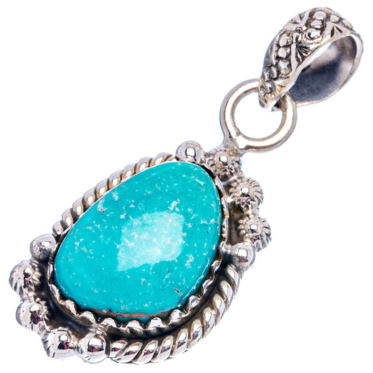 Turquoise oval cabochon sterling silver pendant with detailed bezel and loop bail