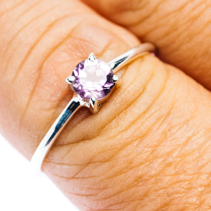 Amethyst round-stone prong ring on .925 sterling silver band, size 8.5