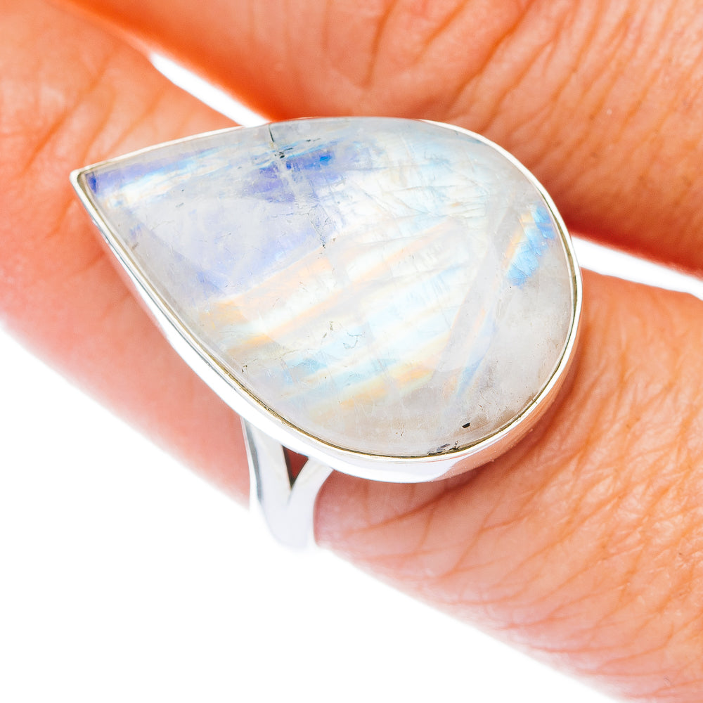 Teardrop moonstone ring with iridescent rainbow stone set in silver bezel