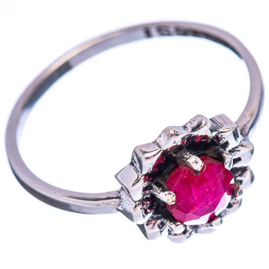 Size 7 .925 sterling silver ring with pink-red round gemstone in ornate bezel