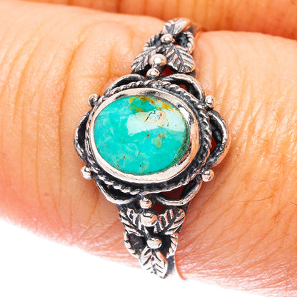 Sterling silver turquoise oval ring with ornate beaded setting, size 8.75