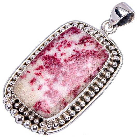 Cinnabar in dolomite pendant with marbled red-and-white rectangular stone in silver frame
