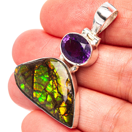 Sterling silver pendant with iridescent ammolite teardrop and purple amethyst bezel