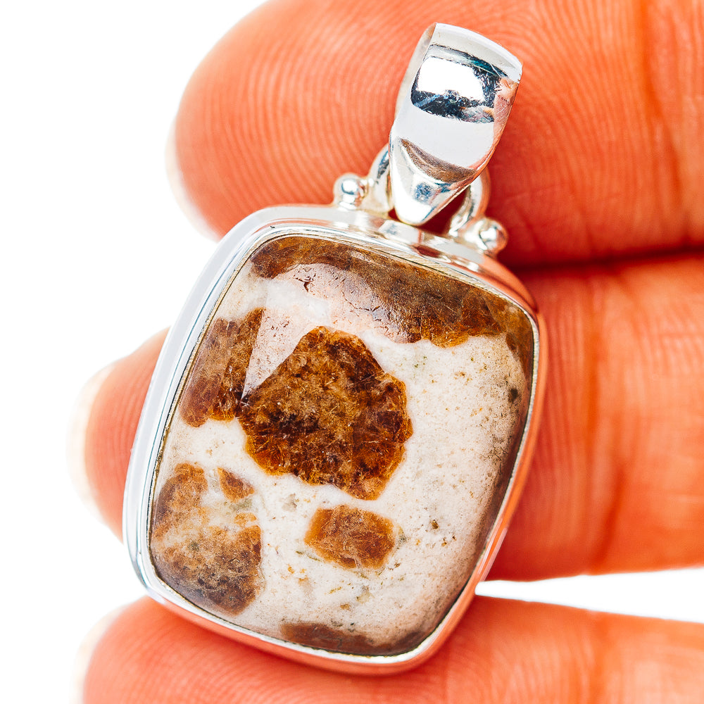 Sterling silver square garnet pendant with mottled brown gemstone in bezel