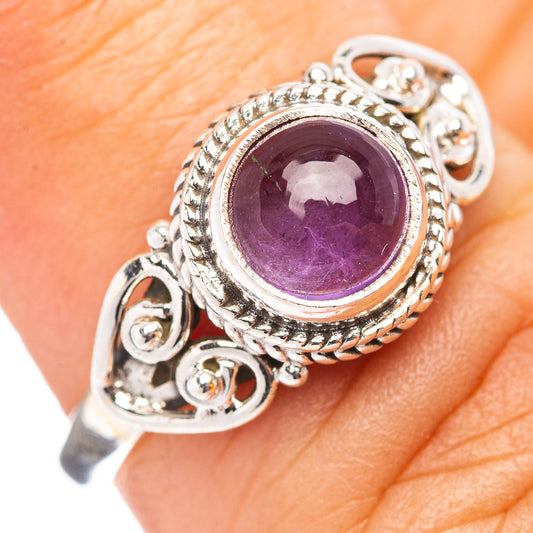 Amethyst gemstone sterling silver ring with ornate bezel and scroll side details